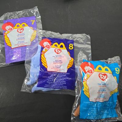 LOT 117: Complete Set of YEAR 2000 TY BEANIES and Incomplete Set of SPY KIDS 2 McDonalds Happy Meal Toys; All in Unopened, Original Packing