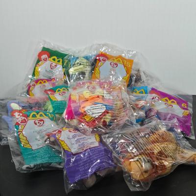 LOT 121: All in Unopened Original Packing; Complete Set of YEAR 2000 TY BEANIES, Incomplete Set of JUSTICE, NICKELODEON VICTORIOUS, and...