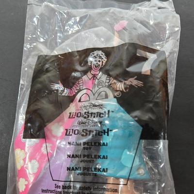 LOT 122: All in Unopened Original Packing; Complete Set of YEAR 2000 TY BEANIES, Complete Set of LILO and STITCH Happy Meal Toys