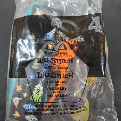 LOT 122: All in Unopened Original Packing; Complete Set of YEAR 2000 TY BEANIES, Complete Set of LILO and STITCH Happy Meal Toys