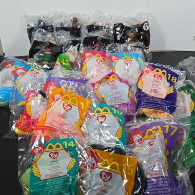 LOT 122: All in Unopened Original Packing; Complete Set of YEAR 2000 TY BEANIES, Complete Set of LILO and STITCH Happy Meal Toys