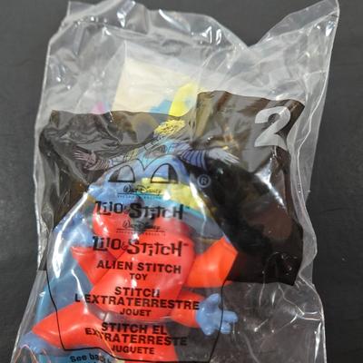 LOT 122: All in Unopened Original Packing; Complete Set of YEAR 2000 TY BEANIES, Complete Set of LILO and STITCH Happy Meal Toys