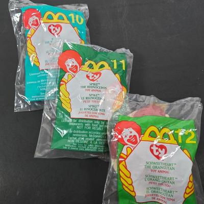 LOT 122: All in Unopened Original Packing; Complete Set of YEAR 2000 TY BEANIES, Complete Set of LILO and STITCH Happy Meal Toys