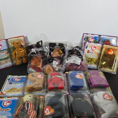 LOT 124: All in Unopened Original Packing; Complete Set of TY BEANIES and Complete Set of RETURN TO NEVERLAND Happy Meal Toys