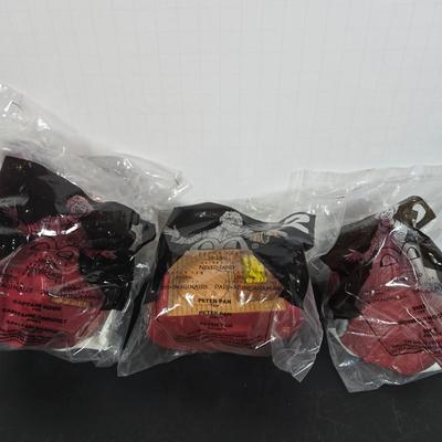 LOT 124: All in Unopened Original Packing; Complete Set of TY BEANIES and Complete Set of RETURN TO NEVERLAND Happy Meal Toys