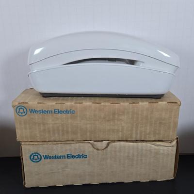 LOT 126: Variety of Vintage Telephones and Accessories