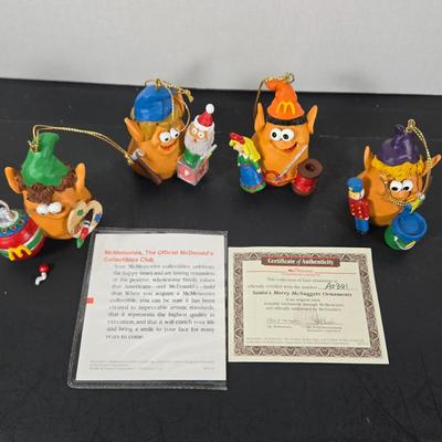 LOT 129: "SANTA'S MERRY MCNUGGETS ORNAMENTS" ,TINY TIM & Small Dept. 56 Ornaments, and Dept. 56 1999 "THE FIRST...