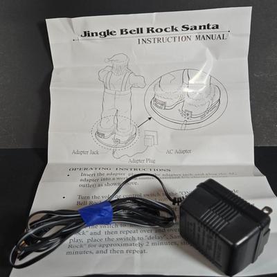 LOT 131: Jingle Bell Rock Santa ,Roller Skating Santa Bear (Untested), and Musical Puppy (Tested and Works) ; Please Note Broken Bell on...