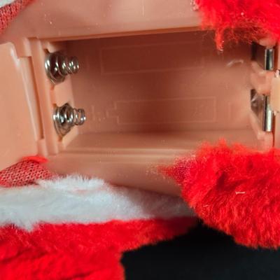 LOT 131: Jingle Bell Rock Santa ,Roller Skating Santa Bear (Untested), and Musical Puppy (Tested and Works) ; Please Note Broken Bell on...