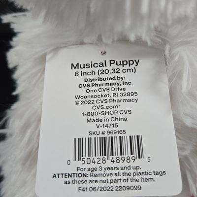 LOT 131: Jingle Bell Rock Santa ,Roller Skating Santa Bear (Untested), and Musical Puppy (Tested and Works) ; Please Note Broken Bell on...