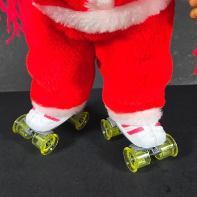LOT 131: Jingle Bell Rock Santa ,Roller Skating Santa Bear (Untested), and Musical Puppy (Tested and Works) ; Please Note Broken Bell on...