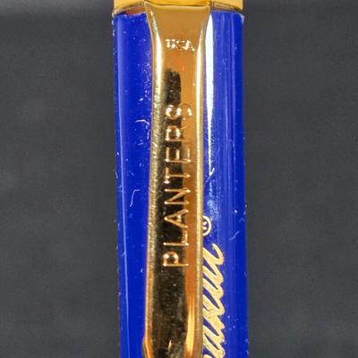 LOT 133: Handcrafted "BUDWEISER" Sailboat, BUDWEISER Pens, MR. PEANUT Bendable Figure, MR. PEANUT Pen, & Vintage Metal...