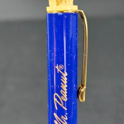 LOT 133: Handcrafted "BUDWEISER" Sailboat, BUDWEISER Pens, MR. PEANUT Bendable Figure, MR. PEANUT Pen, & Vintage Metal...