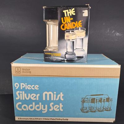 LOT 134: Nine Piece SILVER MIST GLASSES and CADDY SET and THE UN-CANDLE SET; Both Complete