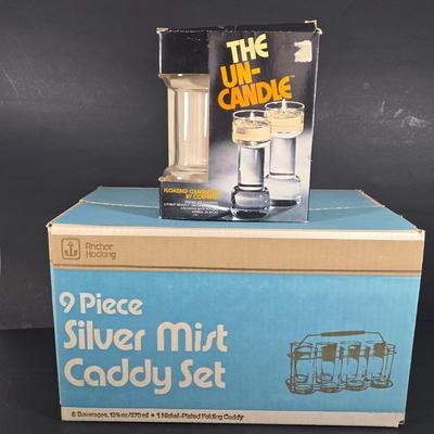 LOT 134: Nine Piece SILVER MIST GLASSES and CADDY SET and THE UN-CANDLE SET; Both Complete