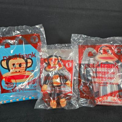 LOT 135: Complete Set of PAUL FRANK Happy Meal Toys, Toy Truck ; Please Note Missing Wheel, Incomplete Set of RONALD and FRIENDS, Large...