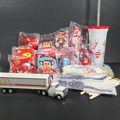 LOT 135: Complete Set of PAUL FRANK Happy Meal Toys, Toy Truck ; Please Note Missing Wheel, Incomplete Set of RONALD and FRIENDS, Large...