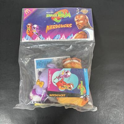 LOT 194: McDonalds NIP Happy Meal Toys: Ty Teenie Beanies Complete Set 1-18, Sega Sonic 1-6 Complete, Space Jam Nerdlucks