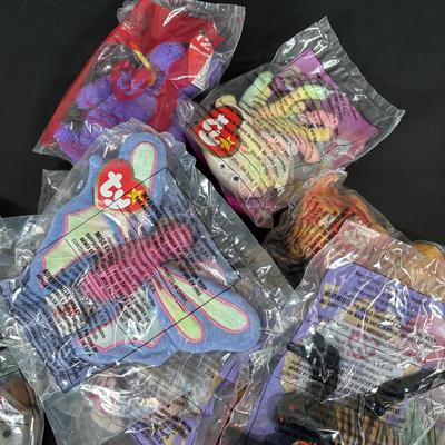 LOT 194: McDonalds NIP Happy Meal Toys: Ty Teenie Beanies Complete Set 1-18, Sega Sonic 1-6 Complete, Space Jam Nerdlucks
