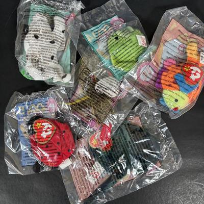 LOT 194: McDonalds NIP Happy Meal Toys: Ty Teenie Beanies Complete Set 1-18, Sega Sonic 1-6 Complete, Space Jam Nerdlucks