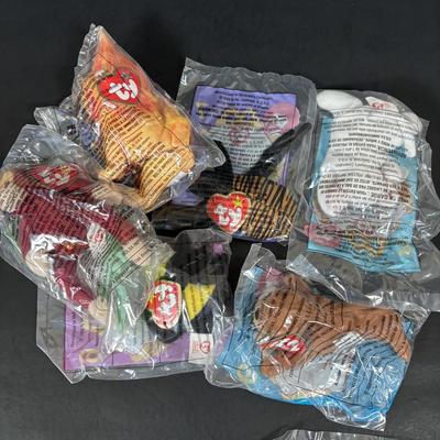 LOT 194: McDonalds NIP Happy Meal Toys: Ty Teenie Beanies Complete Set 1-18, Sega Sonic 1-6 Complete, Space Jam Nerdlucks