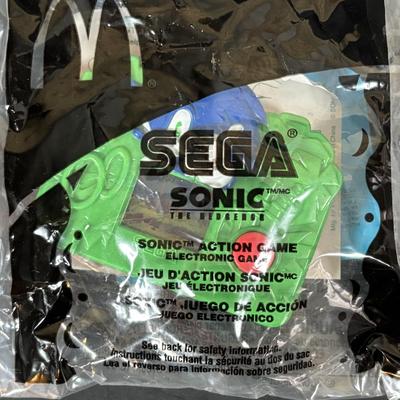 LOT 194: McDonalds NIP Happy Meal Toys: Ty Teenie Beanies Complete Set 1-18, Sega Sonic 1-6 Complete, Space Jam Nerdlucks
