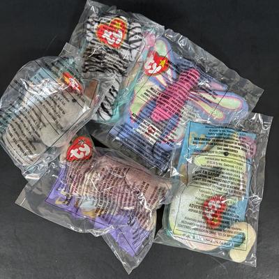 LOT 194: McDonalds NIP Happy Meal Toys: Ty Teenie Beanies Complete Set 1-18, Sega Sonic 1-6 Complete, Space Jam Nerdlucks