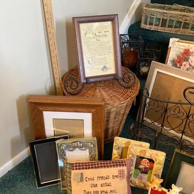 LOT 202: Large Home Decor Collection - Wicker Basket, Frames, Easel, Prints, Candles, Candle Holders and More
