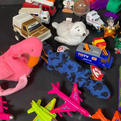 LOT 218: Vintage Toys - Marbles, Bouncy Superballs, Buddy L, Beanie Babies, McDonald's, American Girl Book and More