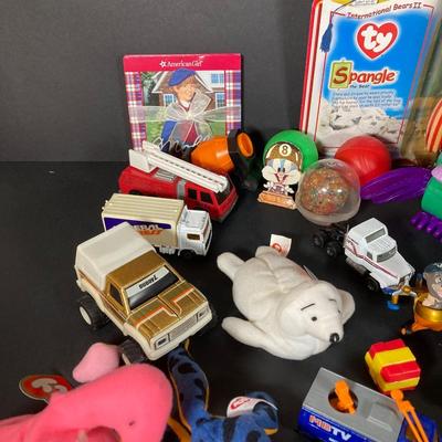 LOT 218: Vintage Toys - Marbles, Bouncy Superballs, Buddy L, Beanie Babies, McDonald's, American Girl Book and More