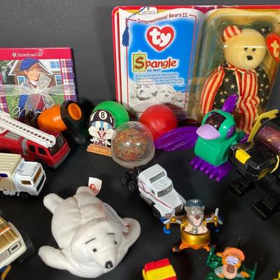 LOT 218: Vintage Toys - Marbles, Bouncy Superballs, Buddy L, Beanie Babies, McDonald's, American Girl Book and More