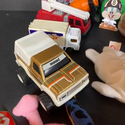 LOT 218: Vintage Toys - Marbles, Bouncy Superballs, Buddy L, Beanie Babies, McDonald's, American Girl Book and More