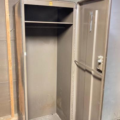 LOT 222: Evans Brand Metal Storage Cabinet
