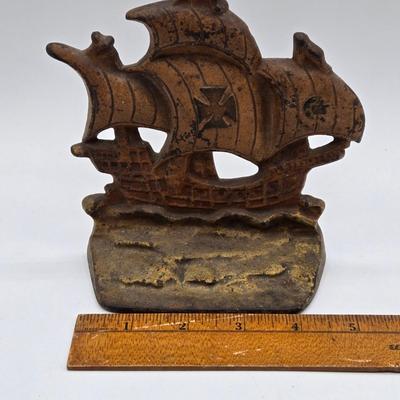 LOT 7X: Antique Milk Glass Battleship , Vintage Sailing Ship Cast Iron Bookend, and Two Vases