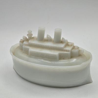 LOT 7X: Antique Milk Glass Battleship , Vintage Sailing Ship Cast Iron Bookend, and Two Vases