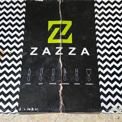 LOT 30K: Nambre Cheese Cutting Board With Knife, Zazza Knife and Serving Set, and Zazza 5 Piece Slate Cheese Marker Set