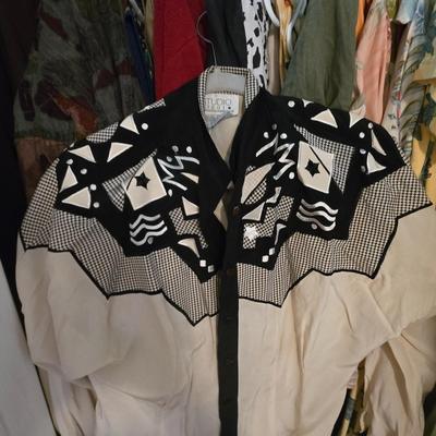 LOT 98Y: Women's Closet Contents With Multiple Items Such as Clothing, Shoes, Belts ; Photos Just Show a Small Sample of Contents