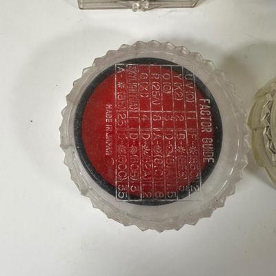 LOT 107L: Vintage Camera Lenses, Film, Filters, Flashes & More Accessories