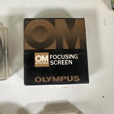 LOT 107L: Vintage Camera Lenses, Film, Filters, Flashes & More Accessories