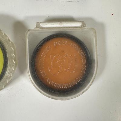 LOT 107L: Vintage Camera Lenses, Film, Filters, Flashes & More Accessories