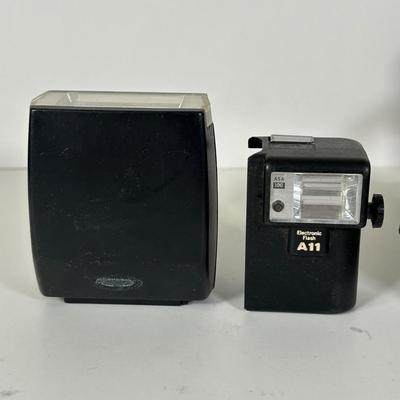 LOT 107L: Vintage Camera Lenses, Film, Filters, Flashes & More Accessories