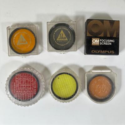 LOT 107L: Vintage Camera Lenses, Film, Filters, Flashes & More Accessories