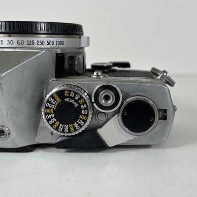LOT 108L: Two Olympus OM-1 Cameras & OM10
