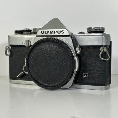 LOT 108L: Two Olympus OM-1 Cameras & OM10