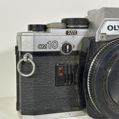 LOT 108L: Two Olympus OM-1 Cameras & OM10