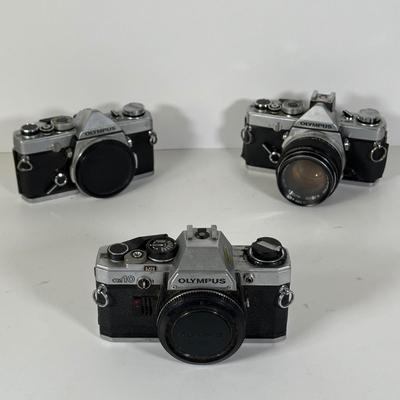 LOT 108L: Two Olympus OM-1 Cameras & OM10