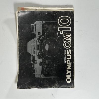 LOT 108L: Two Olympus OM-1 Cameras & OM10