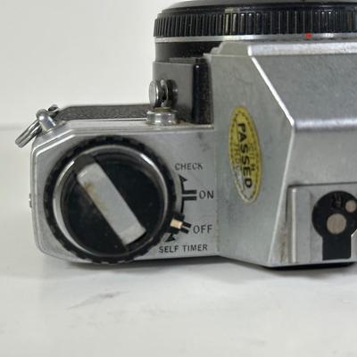 LOT 108L: Two Olympus OM-1 Cameras & OM10