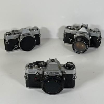 LOT 108L: Two Olympus OM-1 Cameras & OM10