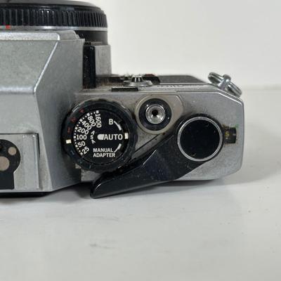 LOT 108L: Two Olympus OM-1 Cameras & OM10